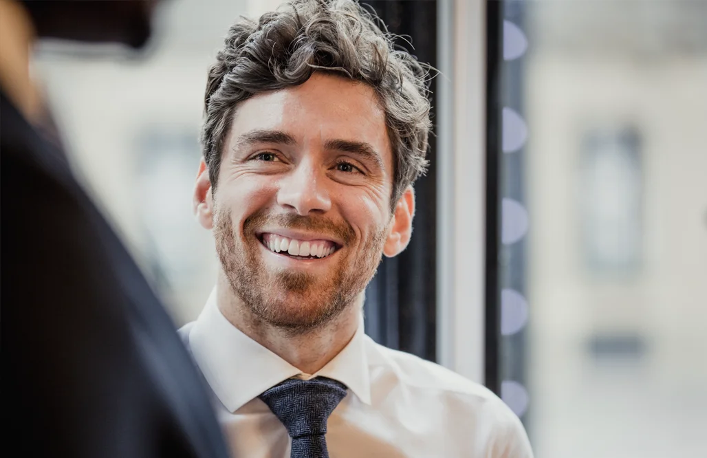 Church of England- businessman looking and smiling