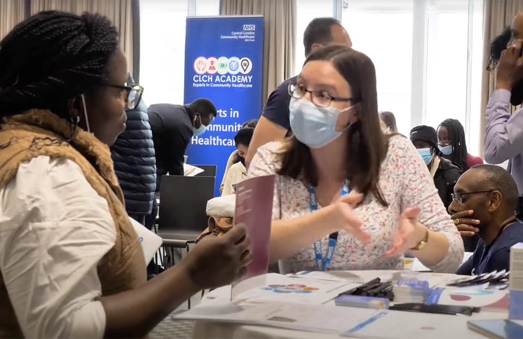 NHS England 2 women having a conversation