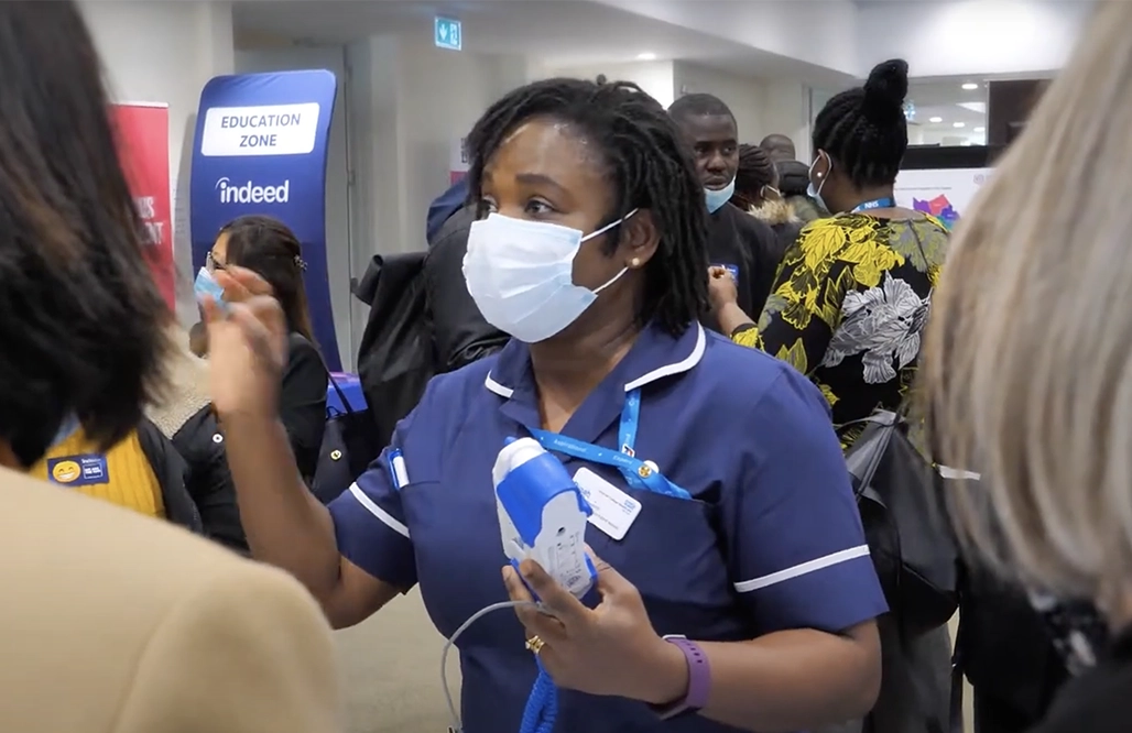 NHS England - nurse at an event