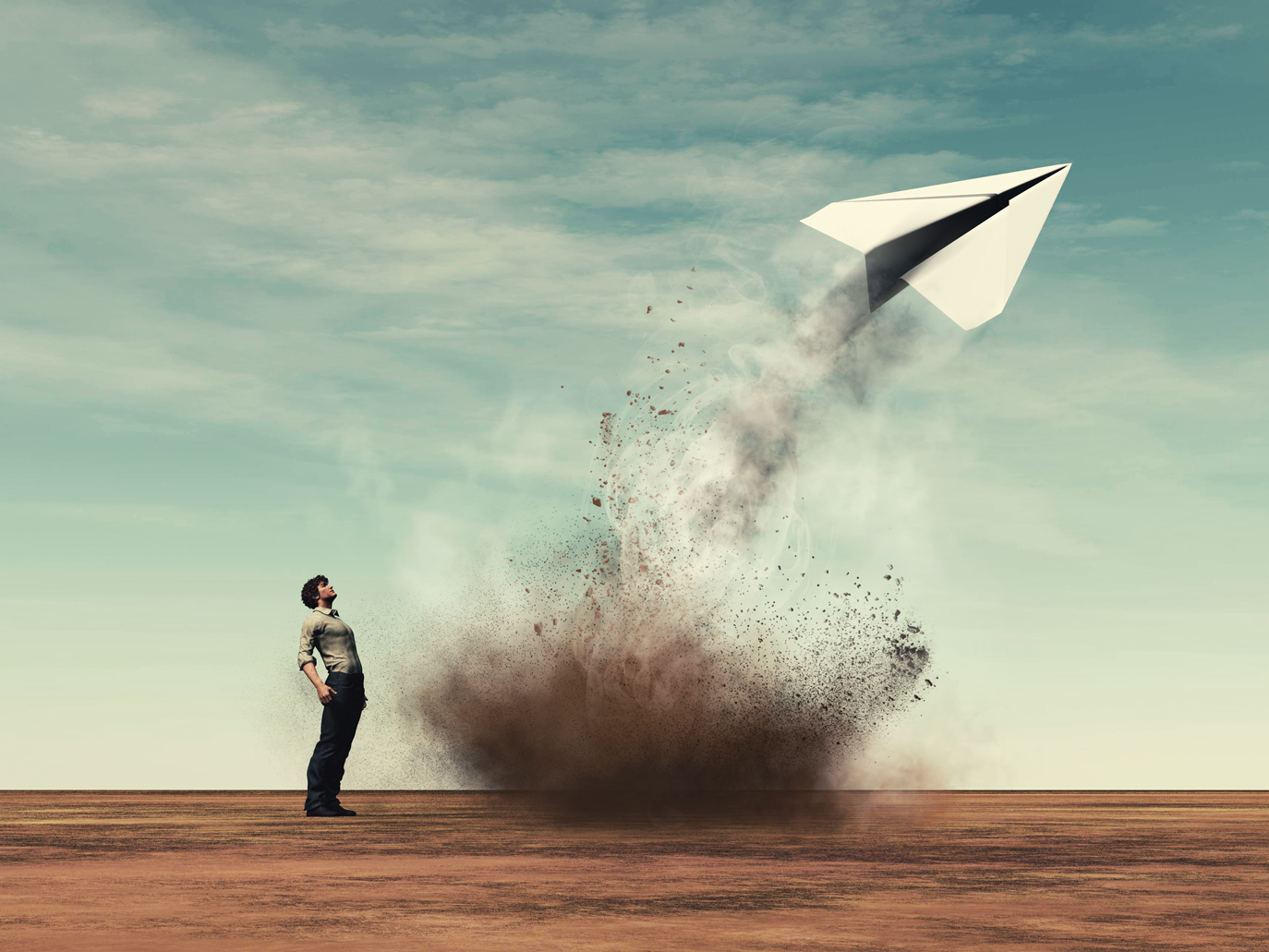 Man looking at a paperplane twice the size of him shooting out from the ground